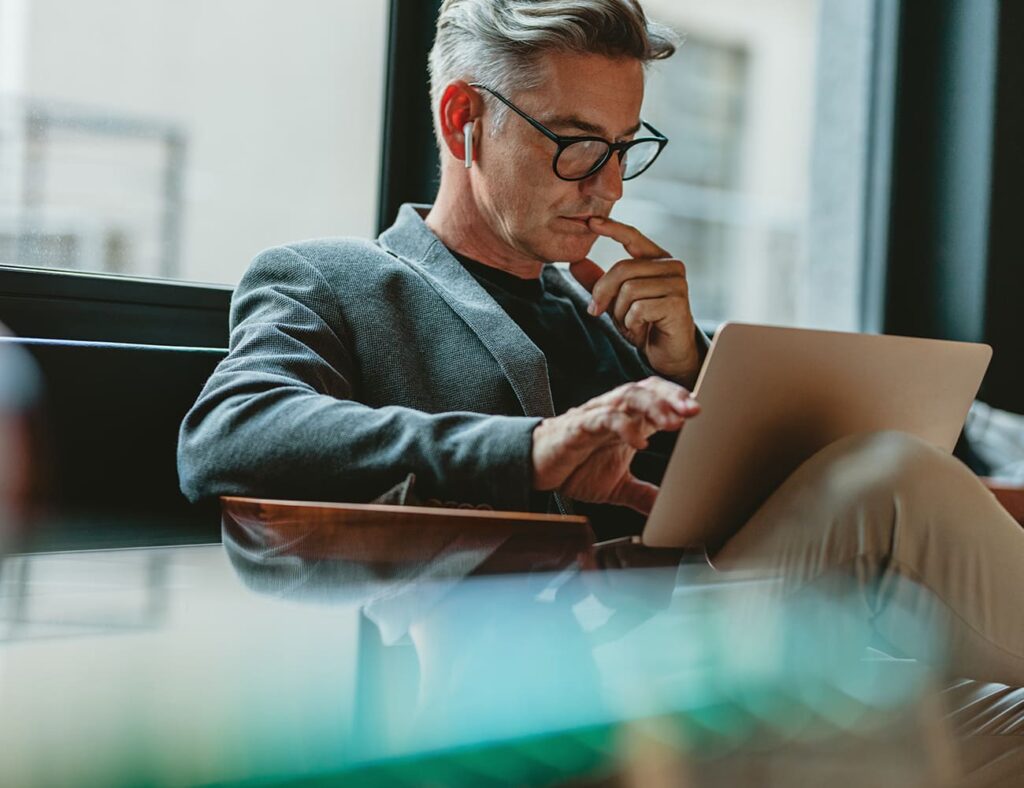 2025 Business Lanscape - Businessman contemplating decisions